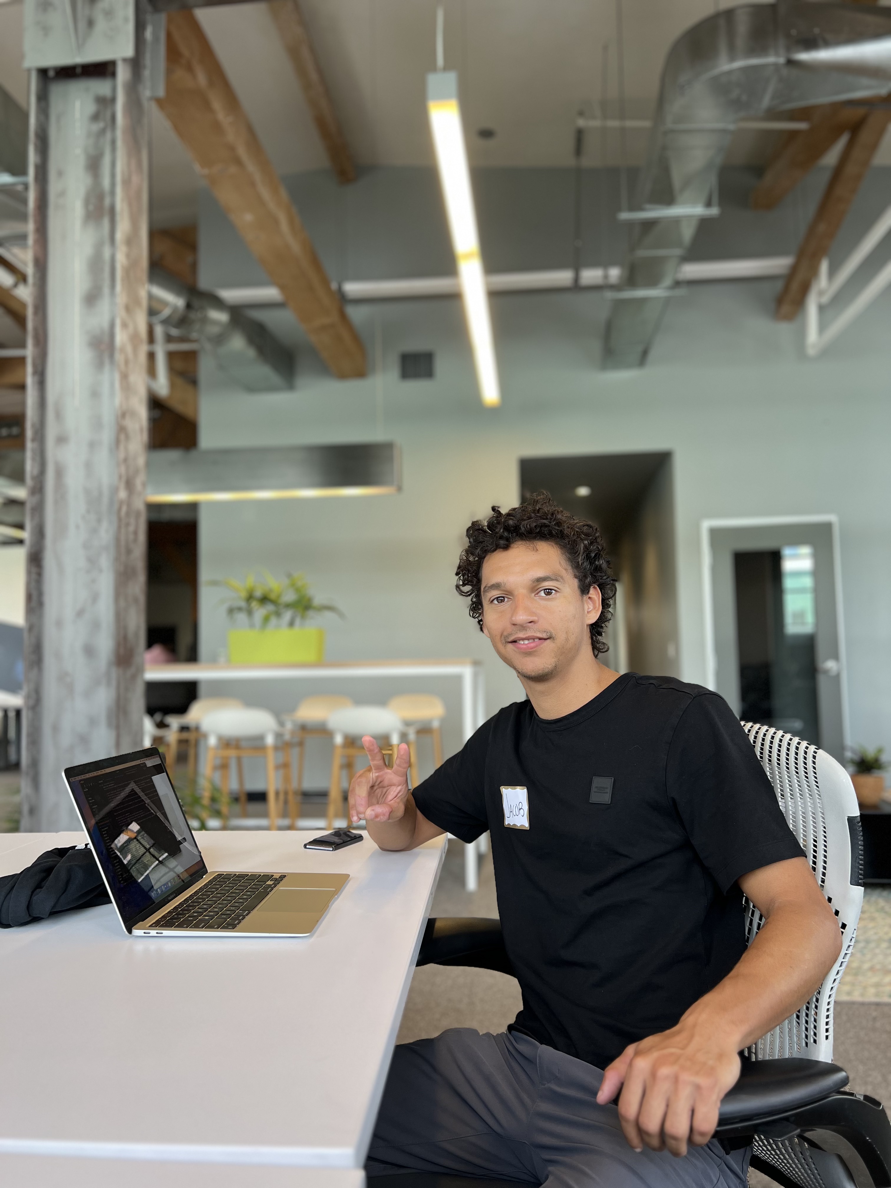 Speaker on stage at an AI conference